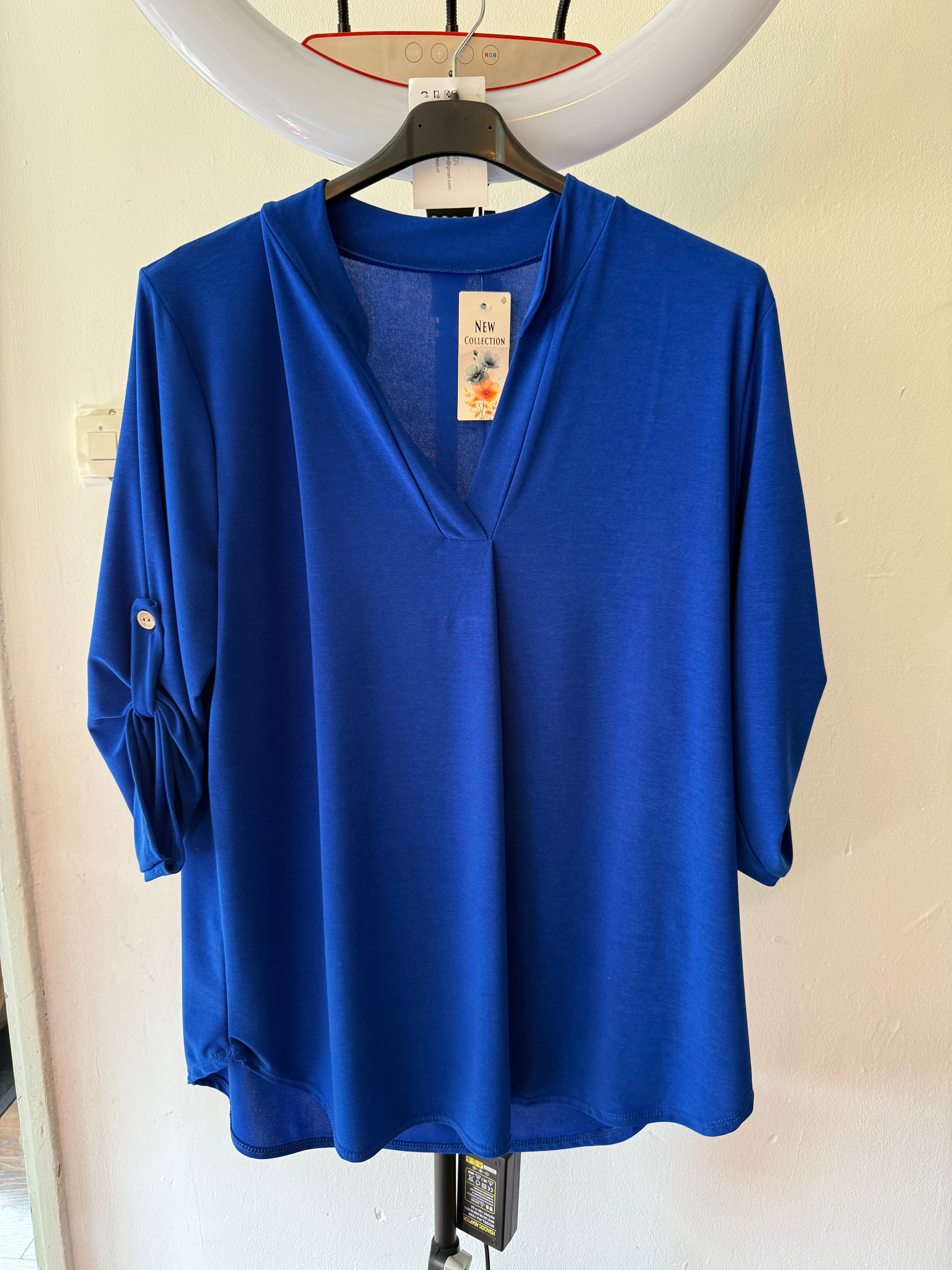 Blauwe shirt korte mouw met knoopjes